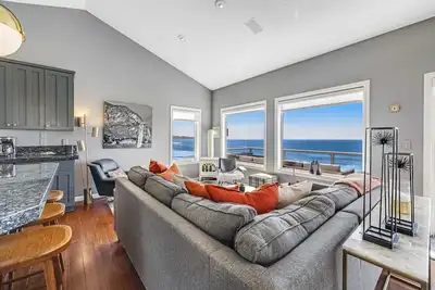 Image de Remodeled home with multiple decks and ocean views short walk to beach