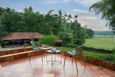 Image de Stay in a 150-year-old heritage estate surrounded by coffee and paddy farms.