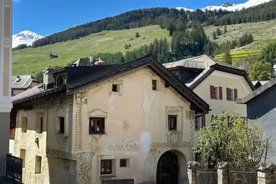 Image de The Chasa Pacific is located in the middle of the village next to the church.