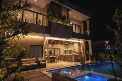 Image de Brand New Beach House designed for your comfort in a private & safe condomínio.