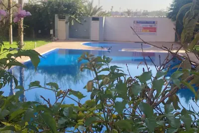 Image de The accommodation Appartement Elias Marrakech, which has an outdoor pool, garden