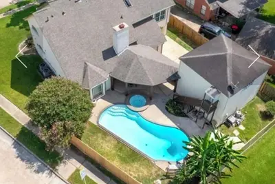 Image de Spacious 4-bedroom house with Amazing pool, gym room and large backyard for party