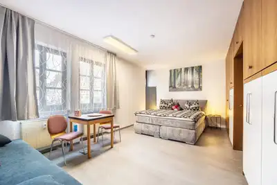 Image de Appartement 'Brunnenblick' (étage) avec vue sur la fontaine Elisabeth et Wi-Fi gratuit (max. 6 pers. )