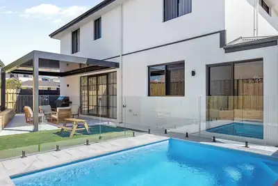 Image de Brand New, this stunning home features fresh furnishings and décor