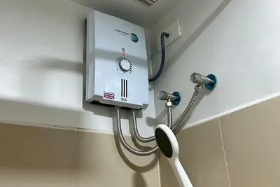 Image de Cozy 1-Bedroom Condo, Walking Distance to Mall of Asia — Pasay City