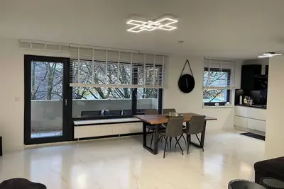 Image de Central apartment with Xxl Tv/Wlan, fully equipped kitchen & fireplace