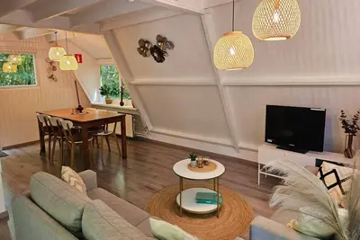 Image de Chalet ardennais rénové avec patio