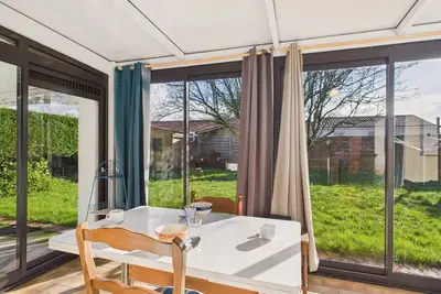 Image de Maison pour 4 avec jardin et véranda