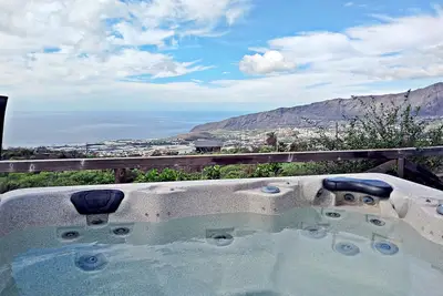 Image de Een knus vakantiehuis met jacuzzi en prachtig uitzicht op de Atlantische oceaan.