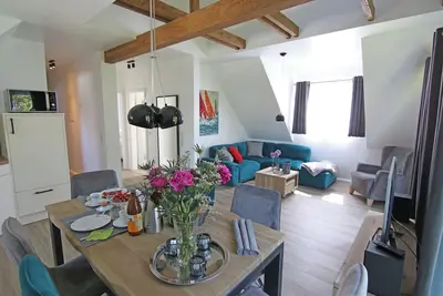 Image de Haus Sorgenfrei vacation apartment no. 9 - relaxing between beach, city & comfort