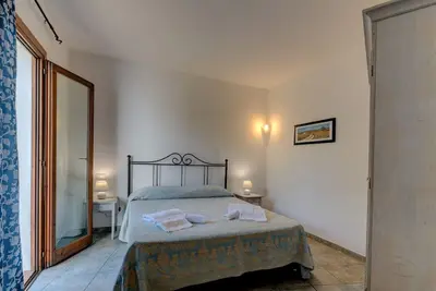 Image de Joli appartement pour 4 personnes avec Wifi, piscine, climatisation et Tv
