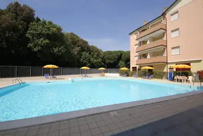 Image de Appartement lumineux à Rosolina avec piscine partagée