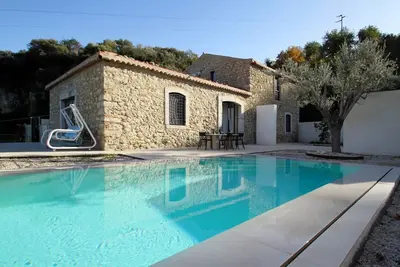 Image de Villa Strega is surrounded by olive groves and Sicilian donkeys that roam freely across the land. Once an ancient stone farmhouse and old olive mill, it has now been transformed into an exclusive residence that preserves its historic charm while offering