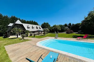 Image de Villa « Maison Normandy » avec piscine partagée, Wi-Fi et climatisation