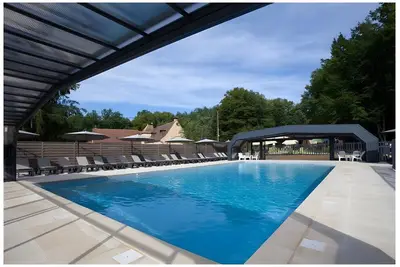 Image de Maison de vacances « Maison 4 Personnes » climatisation proposée piscine partagée