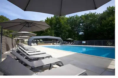 Image de Maison de vacances « Maison 4 Personnes » climatisation proposée et piscine partagée