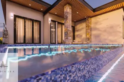 Image de Euphoria suite is a  two bedroom, one bathroom unit with a private kitchen, living room, and laundry room. Perfect for groups or two traveling together seeking extra space, privacy, and elegant Caribbean comfort!