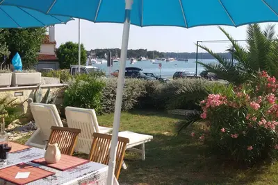 Image de Direkt am Meer liegendes Apartment mit Garten by Interhome