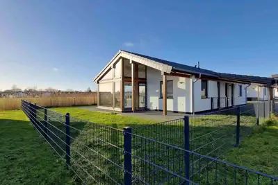 Image de G28 Eingezäuntes Ferienhaus mit Infrarotkabine by Interhome