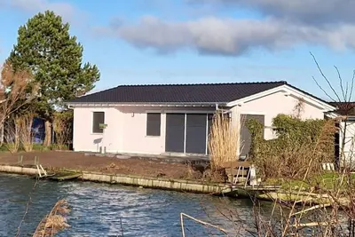 Image de A 17 mit eigenem exklusivem Zugang zum Binnensee by Interhome