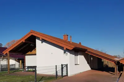 Image de M5 Haus mit Garten, Waschmaschine und Trockner by Interhome