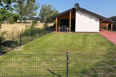 Image de K18 Ferienhaus mit Wiesenblick in Eckwarderhörne by Interhome