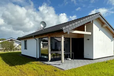 Image de G6 Freistehendes Haus mit Garten und Wallbox by Interhome
