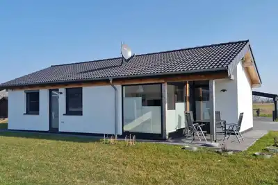 Image de G4 Nordsee-Ferienhaus mit Sauna und Garten by Interhome