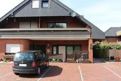 Image de Geräumige Ferienwohnung in Burhave mit Grill, Garten und Pool by Interhome