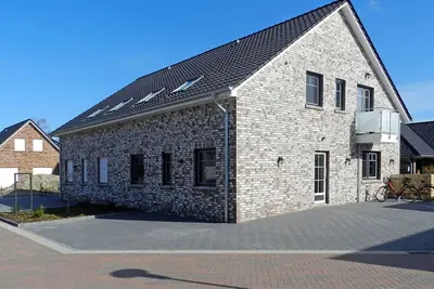 Image de in Burhave mit Großer Terrasse by Interhome