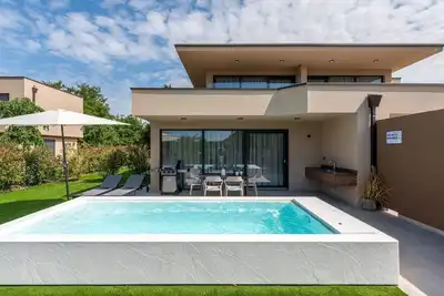 Image de Quercus Village App 10 mit privatem Pool by Interhome