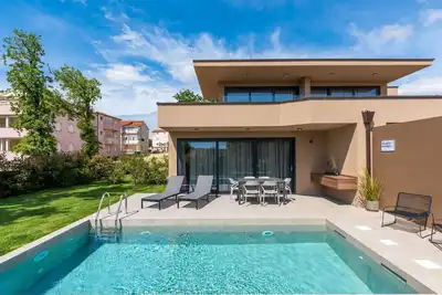 Image de mit eigenem Garten und Terrasse by Interhome