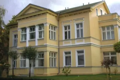 Image de in Gründerzeitvilla in Strandnähe by Interhome