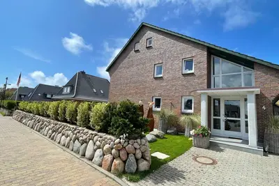 Image de Wohnung in Westerland mit Garten und Terrasse by Interhome