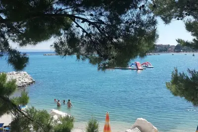 Image de Kinderfreundliches Appartement mit Garten by Interhome