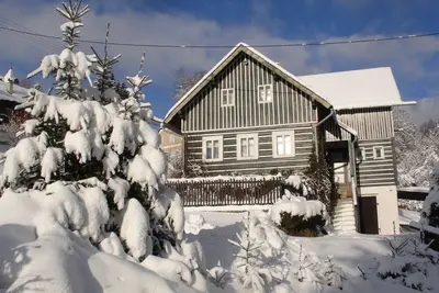 Image de Charmantes, traditionelles Holzhaus by Interhome