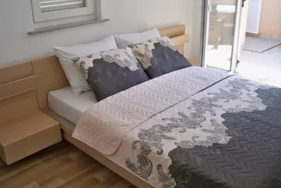 Image de Wohnung mit Blick auf das Wasser by Interhome