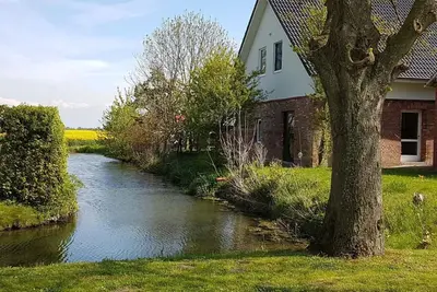 Image de in Landschaftspolder mit Großem Garten by Interhome