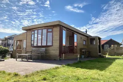 Image de Haus Sonnenschein mit Blick auf das Lauwersmeer by Interhome