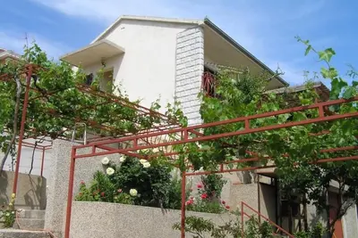 Image de Wohnung mit Balkon und Meerblick by Interhome