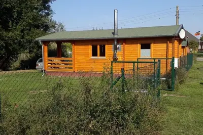 Image de Blockhaus mit eigenem See by Interhome