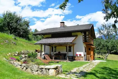 Image de Romantisches Chalet in den Wiesen der Dolomiten by Interhome