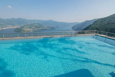 Image de Wohnung mit Panaoramaterrasse und Pool by Interhome