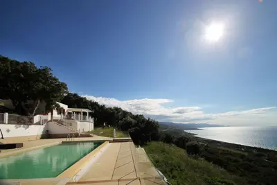 Image de Villa Dammuso is an exclusive villa where tranquility, privacy and comfort come together in a unique setting, surrounded by nature and overlooking the sea. The entire property is for your private use, including the beautiful infinity pool reserved solely