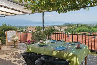 Image de Wohnung mit Blick auf den Gardasee by Interhome