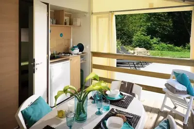 Image de Tithome - 2 chambres - sanitaires collectifs - 21m2 4 à 6 personnes - 4 pers. inclus dans le tarif