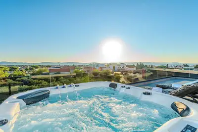 Image de Comfortable apartment with private roof terrace and whirlpool with sea view!