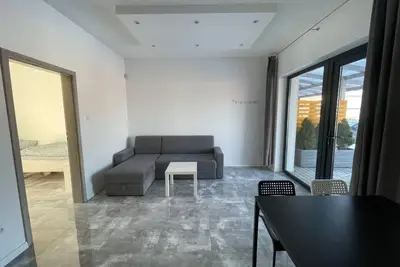 Image de Wohnung in Gąski mit Terrasse, Garten und Grill by Interhome