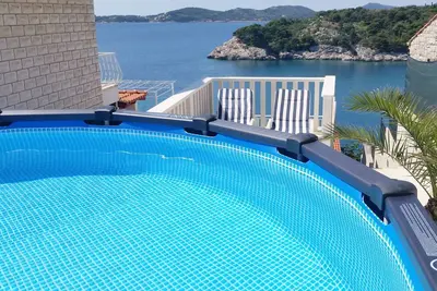 Image de Wohnung \"Ela Ii\" mit Blick auf das Wasser by Interhome