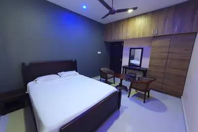 Image de Kousthubam Residency provides comfortable rooms for a calm and relaxing stay